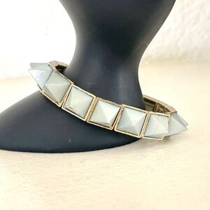 Blue and gold tone "spiky" stretchy bracelet